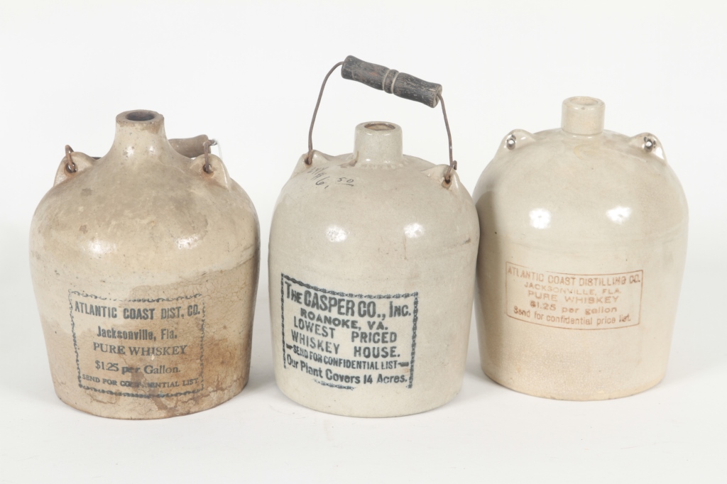 Three Southern Stoneware Distillery Jugs circa 1900. consisting of Casper Company, Roanoke,