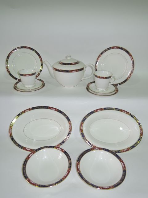 A collection of Royal Worcester Prince Regent pattern dinner and tea wares with blue, gilt and dark