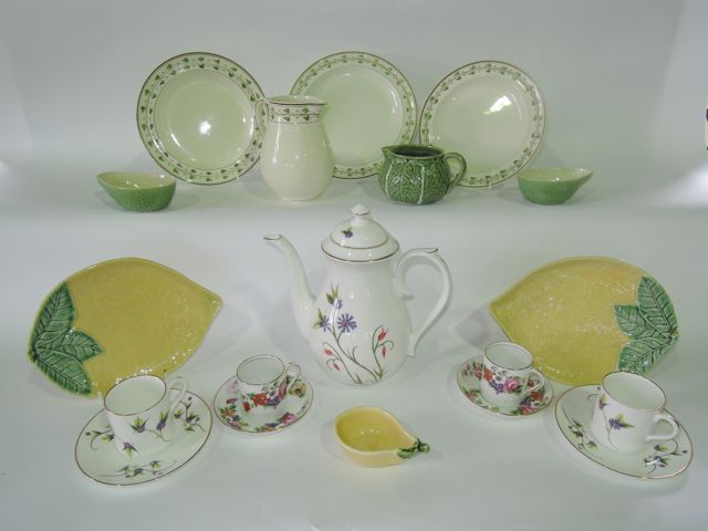 An collection of early 20th century Wedgwood cream ware dinner and tea wares manufactured for James