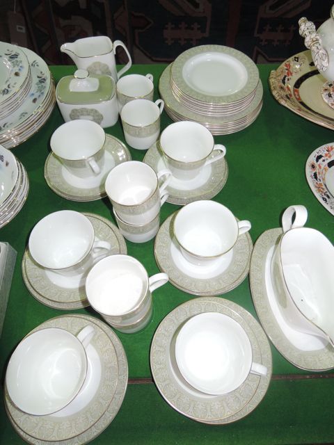 A collection of Royal Doulton Sonnet pattern dinner and tea wares including sauce boat and stand,