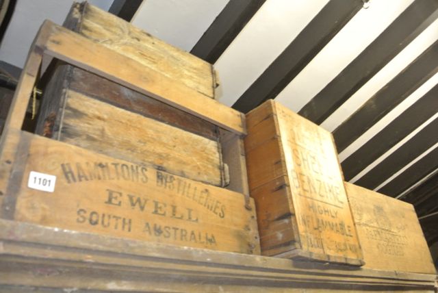 A small collection of vintage wooden packing crates with printed lettering for Hamilton`s