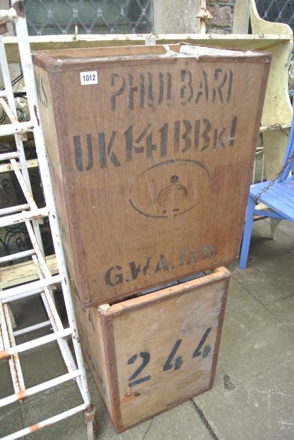 Two tea chests, containing a quantity of kitchen enamelware, mainly pans in varying colourway