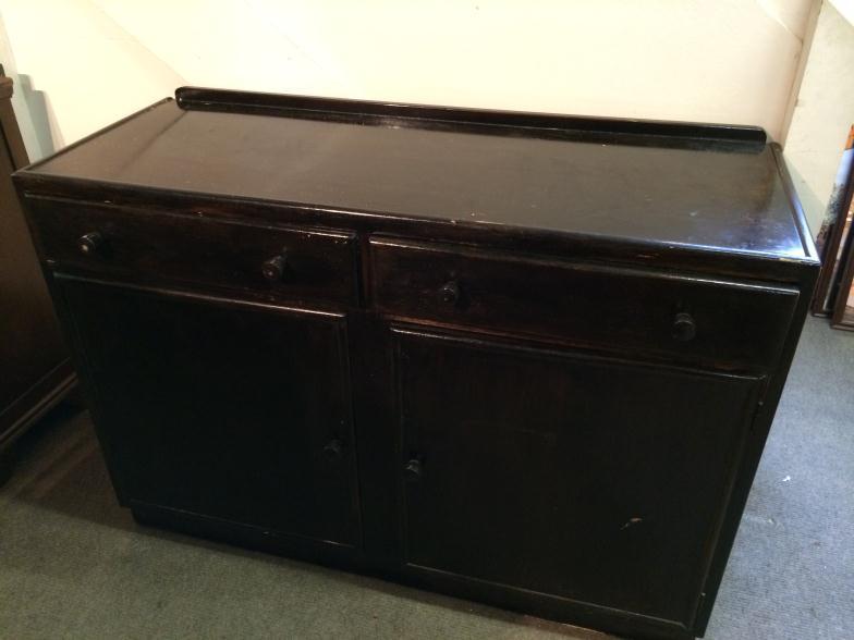 Dark Pine Sideboard With Two Draws and Two Cupboards with One Shelf Inside. Measures 122 wide x 85