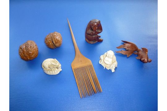 IVORY BUDDHA, TWO POLISHED WALNUTS, CHINESE COMB TOGETHER WITH THREE OTHER ITEMS