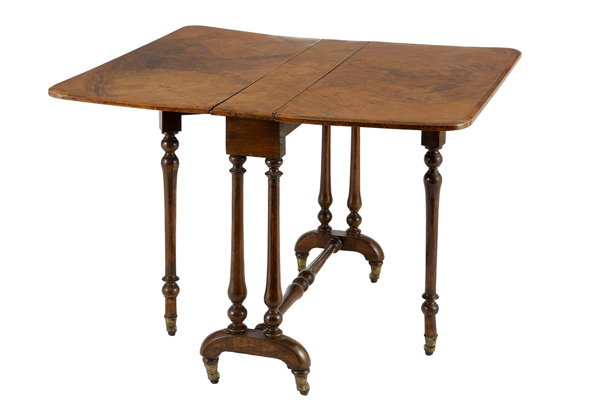 A Victorian walnut Sutherland table, 19th century the hinged rectangular top with rounded corners,