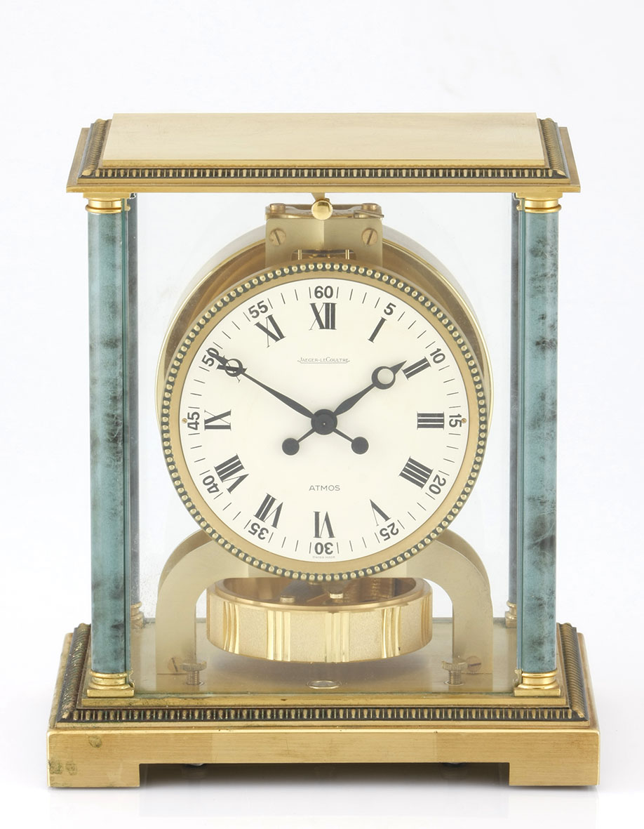 A GILT BRASS ATMOS VENDOME CLOCK, JAEGER-LE COULTRE the white dial with black Roman hours and Arabic