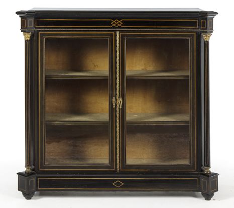 A VICTORIAN EBONISED, INLAID AND BRASS-MOUNTED DISPLAY CABINET the shaped rectangular top with