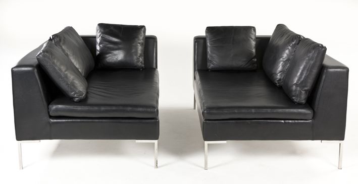 A TWO-PART ITALIAN BLACK LEATHER SOFA, 20TH CENTURY each padded back, seat and arms on steel