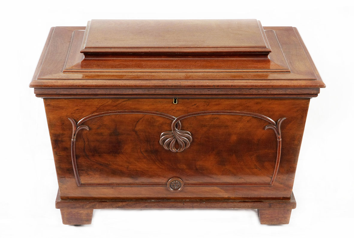 A William IV mahogany wine celarette, 1830s os sarcophagus form, with a stepped hinged lid,