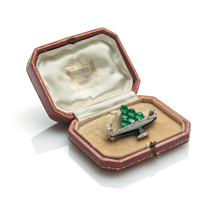 A CASED EMERALD, DIAMOND AND BLACK ENAMEL BROOCH, DESIGNED BY CHARLES JACQUEAU FOR CARTIER in the