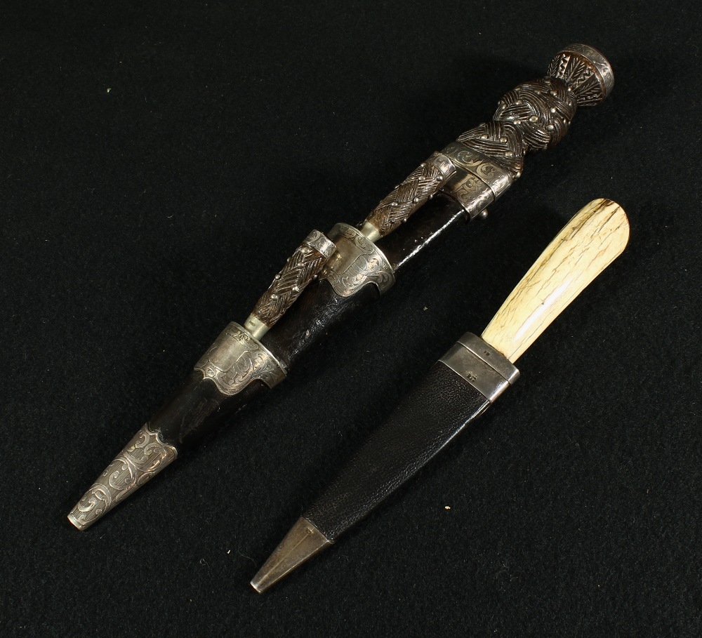 Edwardian white metal mounted dirk of typical form, the finial with inset faceted cairngorn and