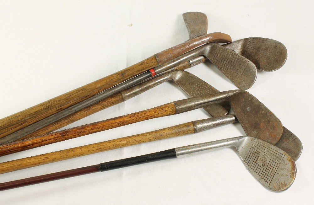 Eight hickory shafted golf clubs including Anderson of St Andrews Blackhawk seven iron and putter, J