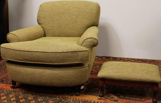 Howard & Sons armchair upholstered in gold corduroy, on square supports and a non matching stool
