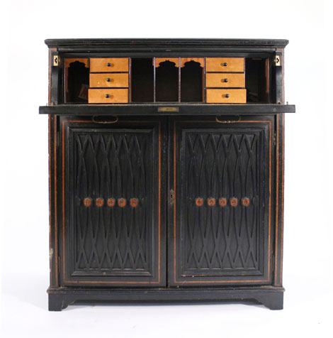 A Victorian ebonised and rosewood crossbanded secretaire with fitted drawer and two slides