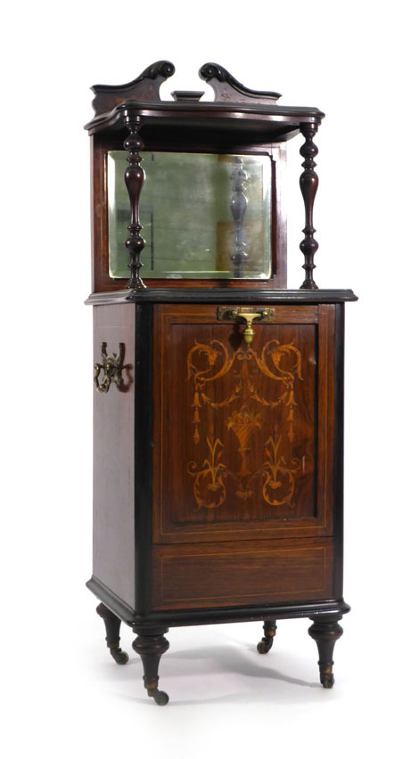 An Edwardian rosewood, strung and inlaid coal cabinet with raised shelf and mirror back on toupe