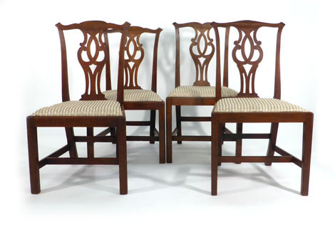 A set of four 18th century Chippendale-style mahogany framed dining chairs   CONDITION REPORT: