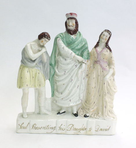 A titled figural group inscribed 'Saul Presenting his Daughter to David', the three figures standing