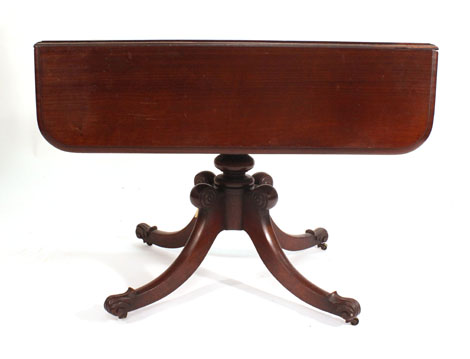 A 19th century mahogany pembroke table with single freize drawer on a quadruple sabre base, l. 102