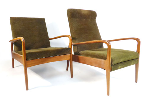 A pair of Greaves & Thomas teak framed armchairs with green button back upholstery    CONDITION