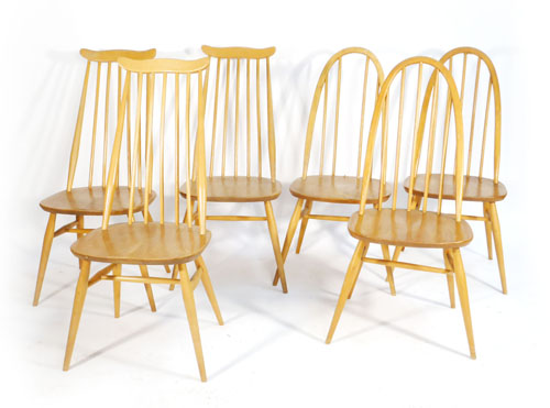 A harlequin set of Ercol dining chairs including three Goldsmith and three Quaker spindle backs