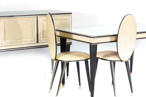 An Italian dining suite including table and six chairs, sideboard and mirrored cabinet, each covered