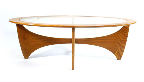 A G-Plan ovoid teak framed coffee table with glass insert, l. 123 cm   CONDITION REPORT: