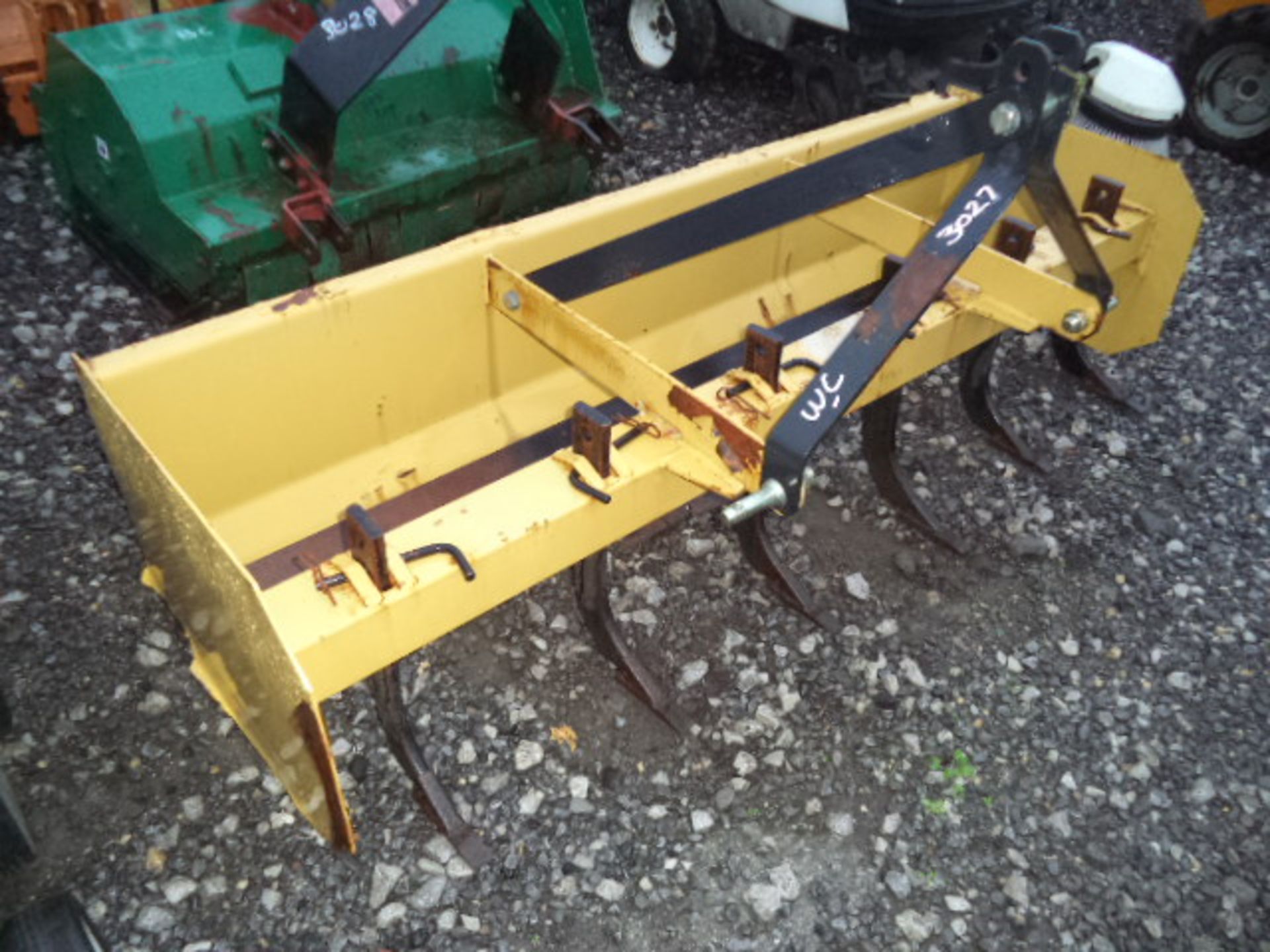 Soil grading attachment