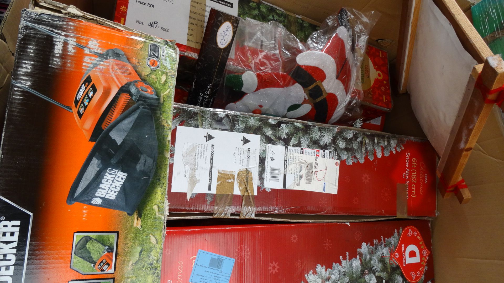 1 Pallet of various customer returns to include: quantity of christmas trees and christmas lights,