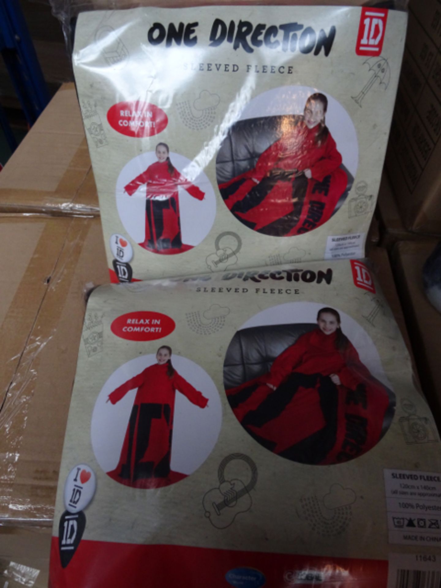 12 x One Direction Sleeved Fleece. 'Relax in comfort' 120cm x 140cm. High retail value. Brand new