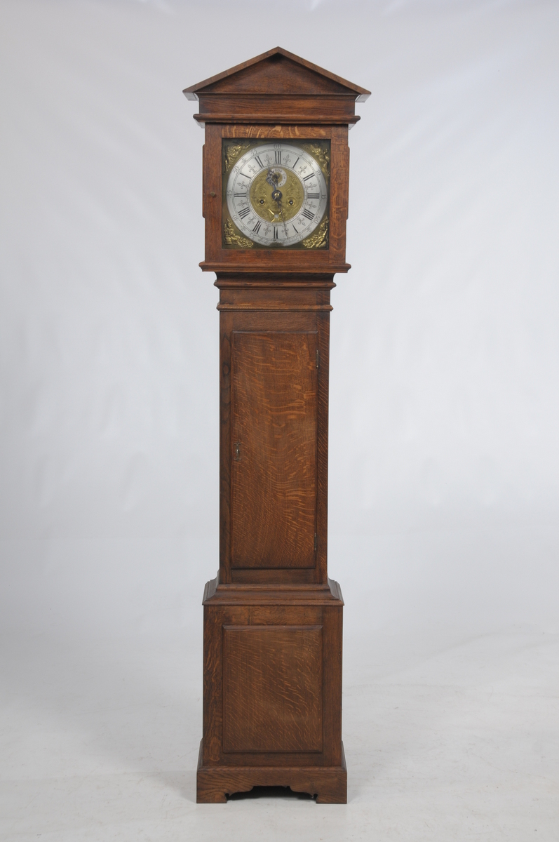 An oak long case clock with an 18th century 30.5cm brass and silvered dial signed Lupton, Altrincham