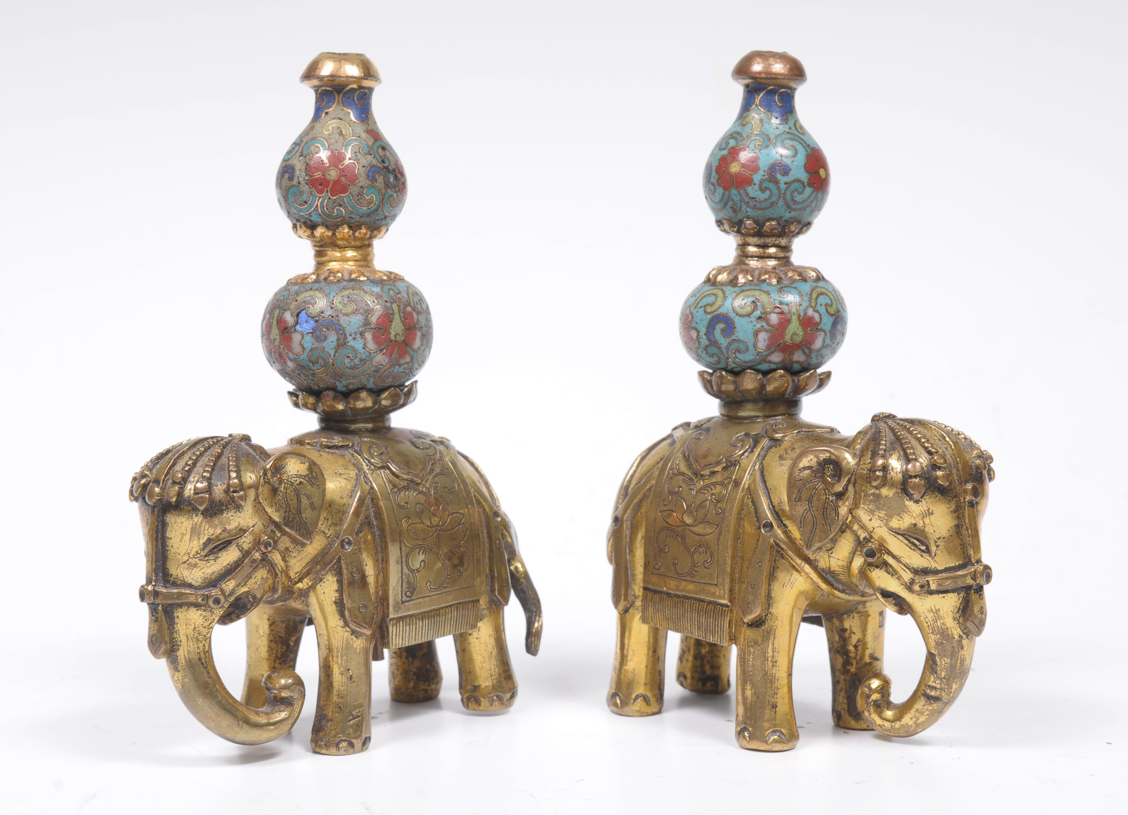 A pair of Chinese gilt-bronze cloisonne elephant incense holders, probably 18th/19th century, each