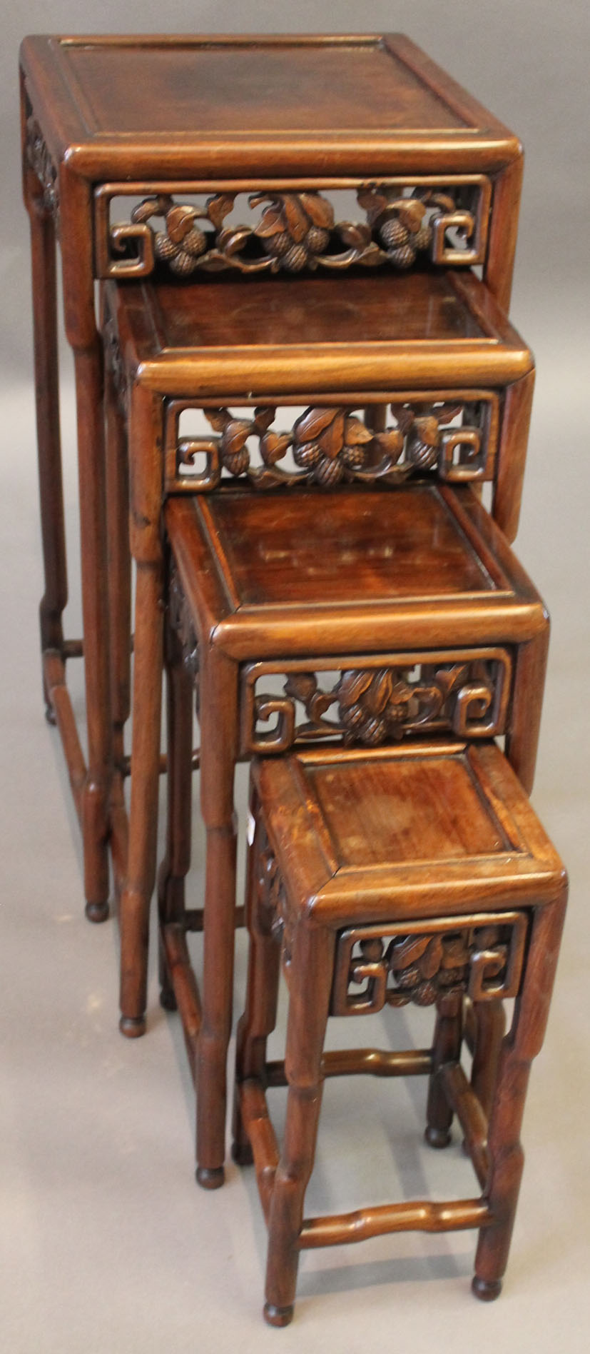 A fine quality Quartetto nest of Chinese huanghuali style tables, late Qing dynasty (1644-1912), the