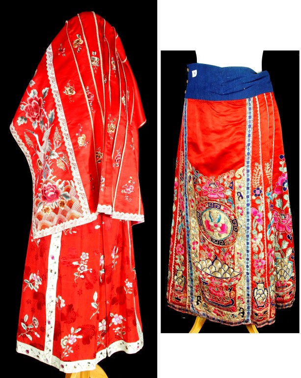 A group of three Chinese embroidered panel skirts, 20th century, all with a red ground and gold
