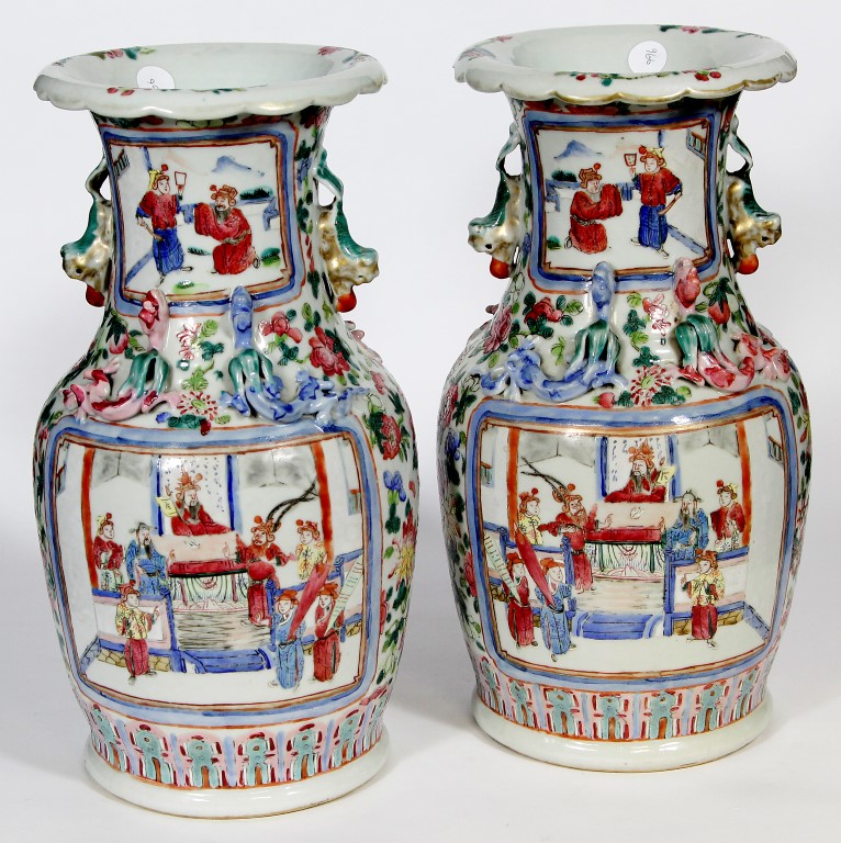 A pair of Chinese Canton famille rose vases, late Qing dynasty (1644-1912), each of baluster form