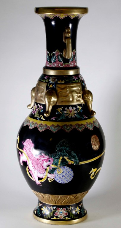 A Chinese famille noire vase, Qianlong seal mark (1736-95), 20th century, of baluster form rising to