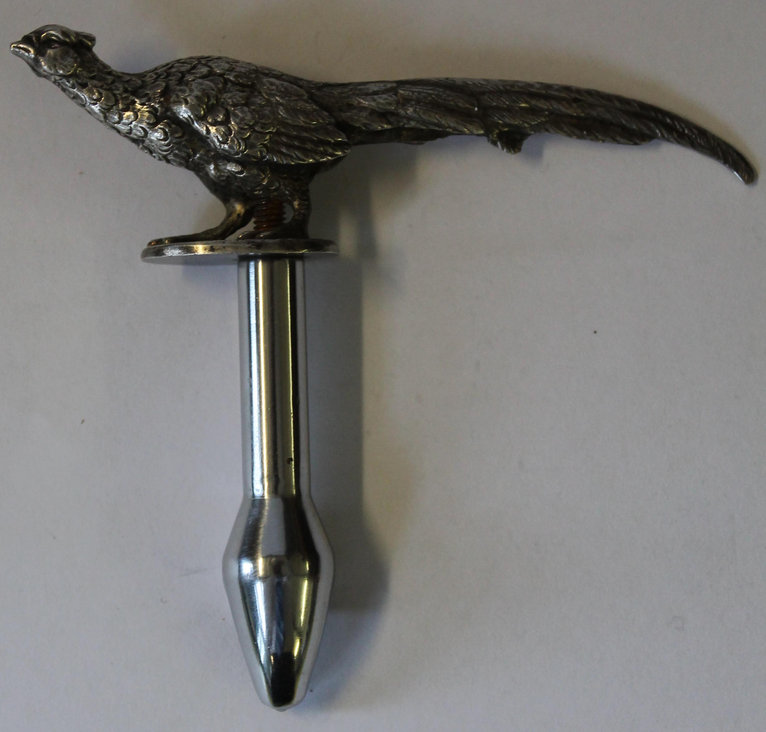 A modern hallmarked silver bottle opener with pheasant finial, made by J D Chatterley & Sons Ltd,