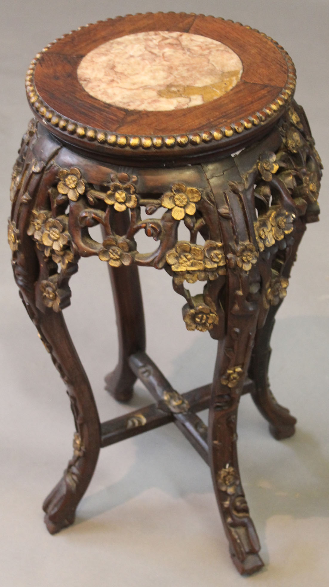 A Chinese hardwood and marble topped jardinière stand, late Qing dynasty (1644-1912)/Republic period