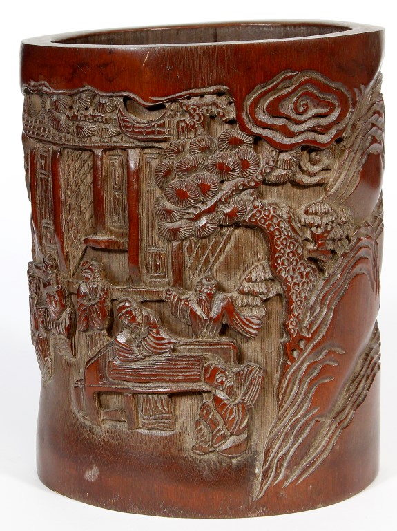 A Chinese bamboo brush pot, bitong, 20th century, of cylindrical form, the exterior sides carved