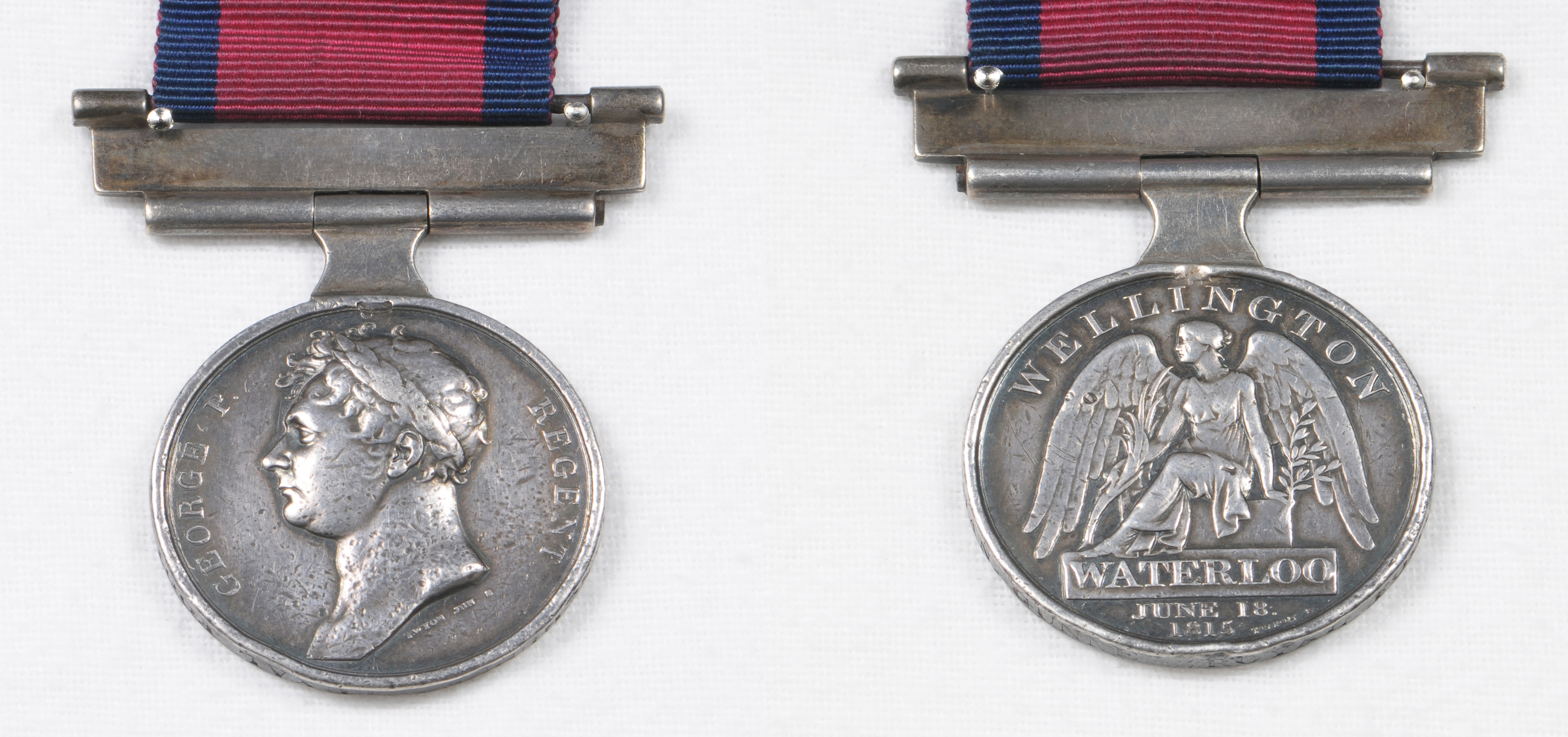 A Waterloo medal awarded to Joseph Redman gunner of the Royal foot artillery, with later white metal