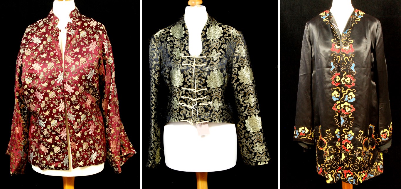 A collection of three Chinese robes and embroidered jackets, 20th century, to include a black