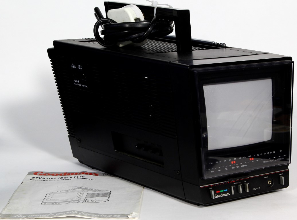 A Goodmans GTV9100 Integrated AM/FM Radio/6" Colour TV. With instruction manual.