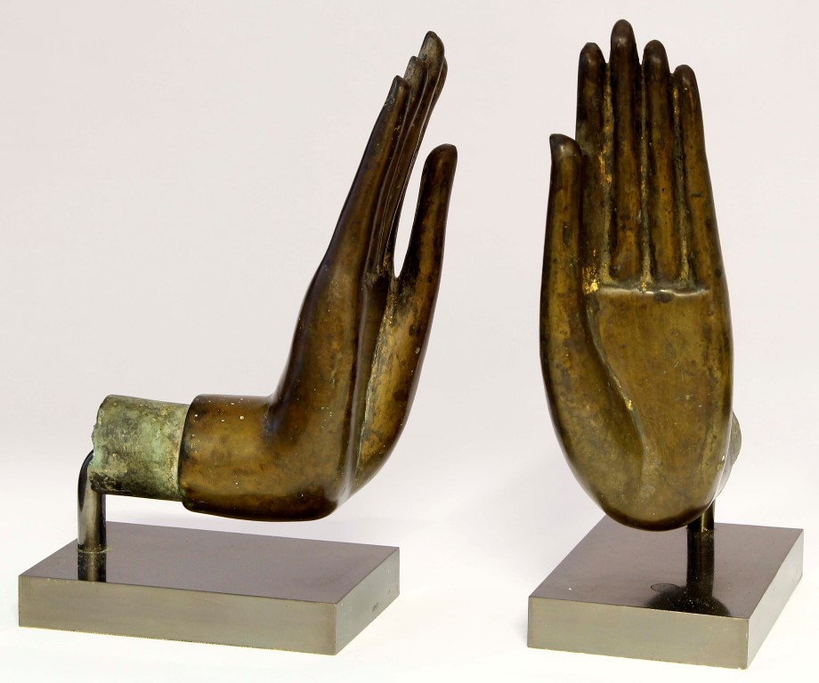 A pair of Thai / Burmese bronze Buddha hands, 19th century, cast in Abhaya Mudra, later mounted on