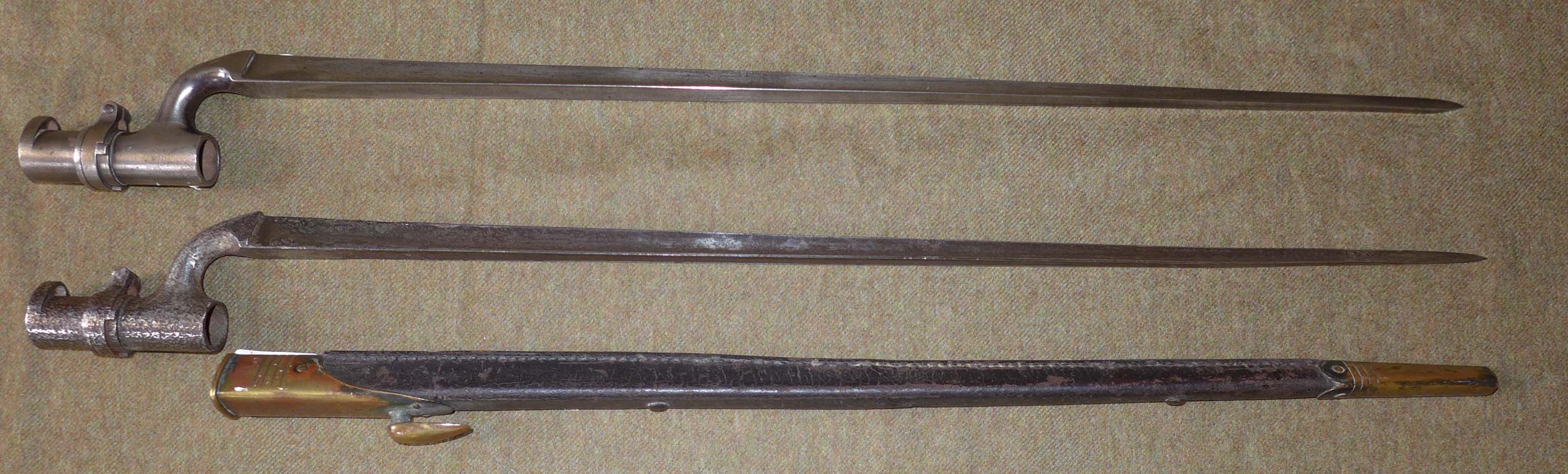 A British 1853/72 Martini-Henry socket bayonet, length of blade 55cm, 1876 Martini-Henry socket