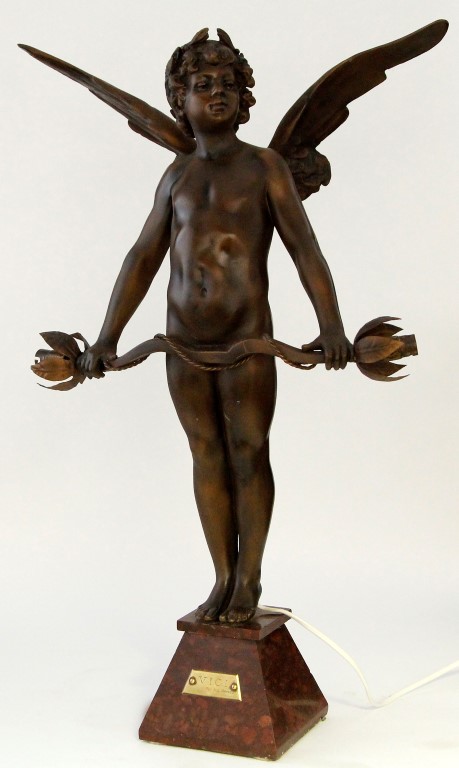 An early 20th century patinated spelter figural lamp, after Auguste Moreau (French 1834 - 1917)