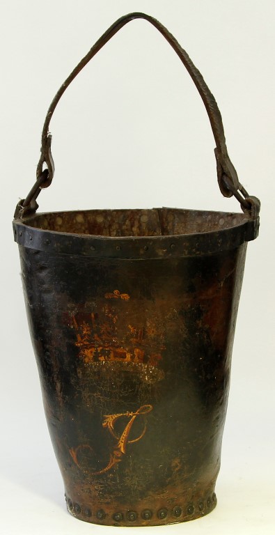 A 19th century leather studded fire bucket, with bound loop rings and leather strap handle,