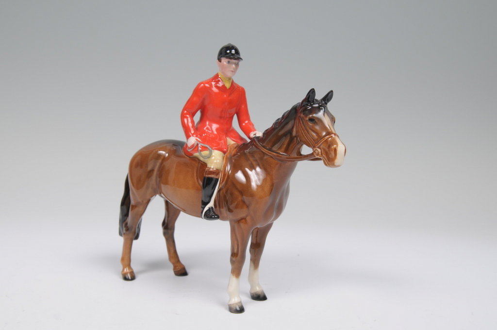 A BESWICK HUNTSMAN ON A BROWN HORSE, model No: 1501 by A Gredington, 21.5cms, issued 1957-1995