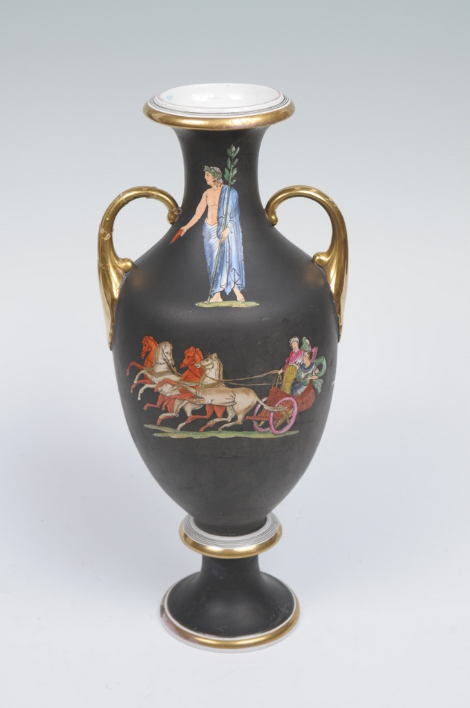 A STAFFORDSHIRE GRECIAN STYLE VASE, gilt scroll leafy handles overall decorated with charioteers,