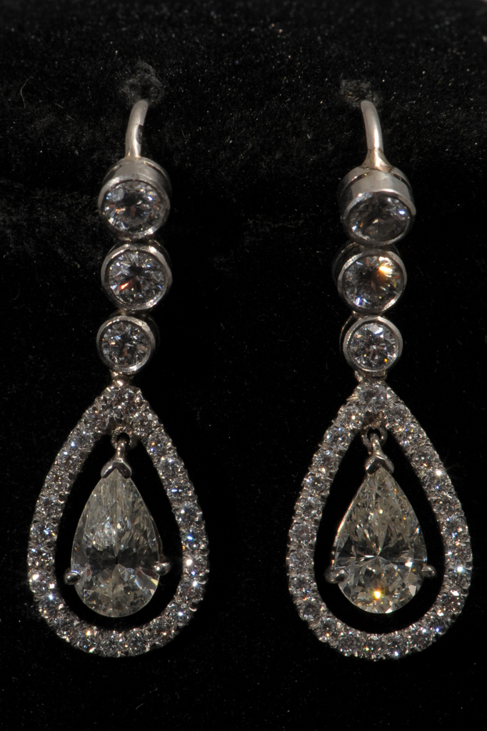 A PAIR OF ATTRACTIVE MODERN ARTICULATED DROP EARRINGS, Lower drop section with central pear shaped