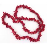 LADIES RED CORAL NECKLACE A large red coral necklace of approx 33 inches, with hundreds of pieces.