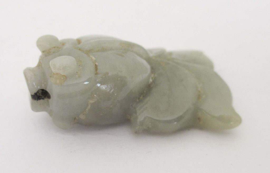 CHINESE CARVED GREEN JADE GOLDFISH Nicely carved jade fish. Holed for wear as a pendant.